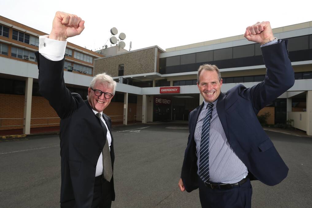 South West Healthcare chair Bill Brown and CEO Craig Fraser celebrate the $384 million announcement for the Warrnambool Base Hospital's redevelopment. Picture: Mark Witte