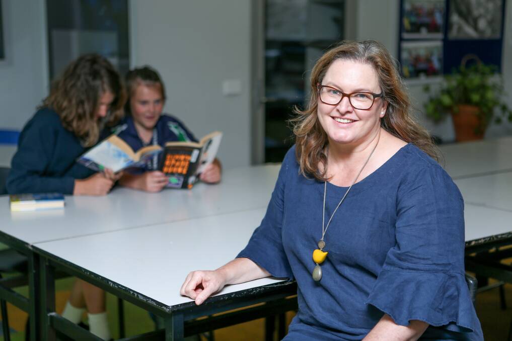 HELPING HAND: Warrnambool College tutor Louise Johnson is one of four tutors to work full time in classrooms with students this year. Picture: Chris Doheny