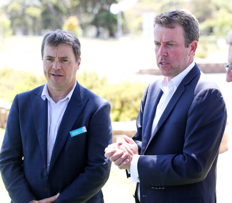 FEE CHANGES: Warrnambool Deakin campus director Alistair McCosh has welcomed the funding increase for certain degrees, he's pictured with federal Education Minister Dan Tehan last year. 