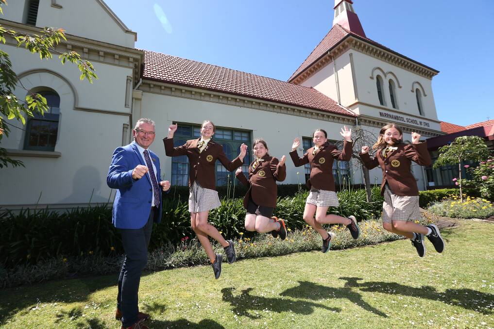 FRESH COAT: Warrnambool Primary school principal Peter Auchettl with students Eden Sextus, Phoebe Baker, Charli Johnstone and Izaiah Jarvis. Picture: Mark Witte