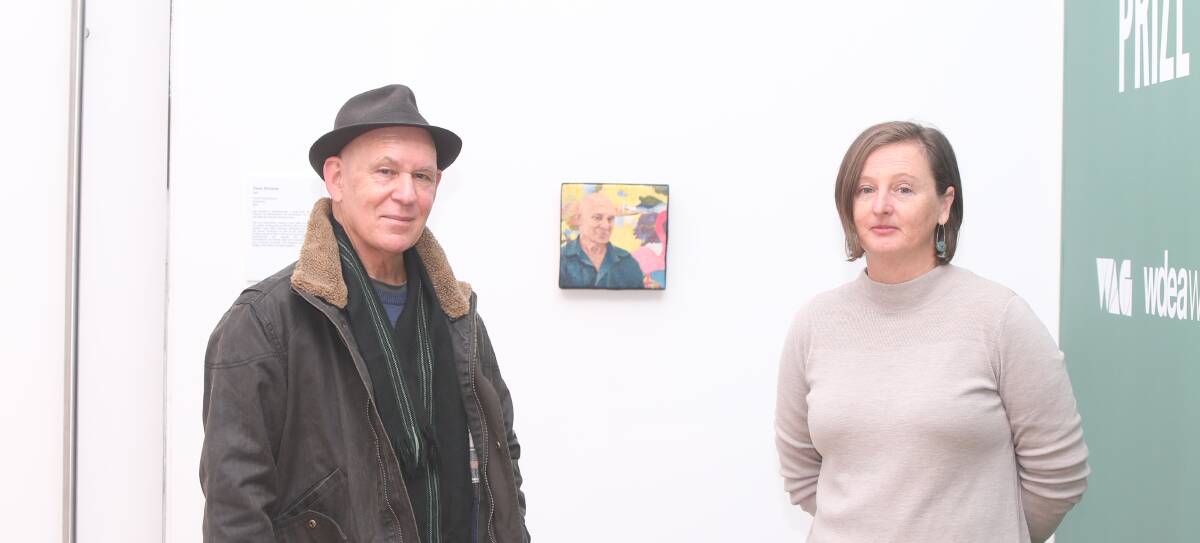 ARTISTIC MENTOR: Karen Richards' embroidery portrait 'Des' won the 2020 Warrnibald art prize. She's pictured with the portrait's sitter Des Bunyon. Picture: Mark Witte. 