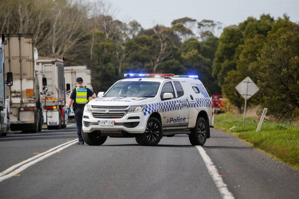 Police block the road after an accident on the Princes Highway.