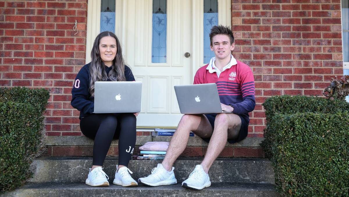 LESSONS LEARNED: Emmanuel College VCE students Sophie and Will Woolstencroft are learning from home for the second time this year. Picture: Mark Witte