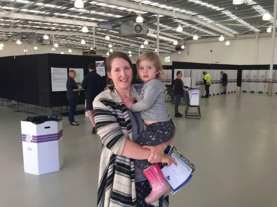 VOTING EARLY: Emily Evans voted early at Warrnambool's early voting centre this week with her daughter Charlotte, 2. Picture: Jackson Graham