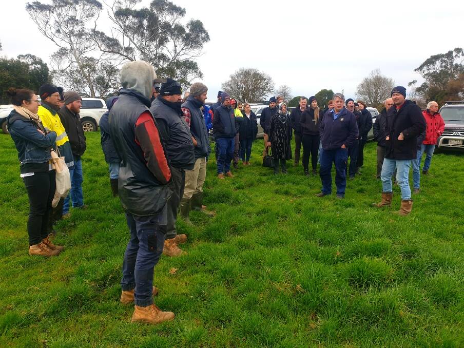 Low-carbon future: Sam Doolan and Geoff Rollinson explaining the soil trial site to attendees at the Keeping Carbon on the Farm field day. 