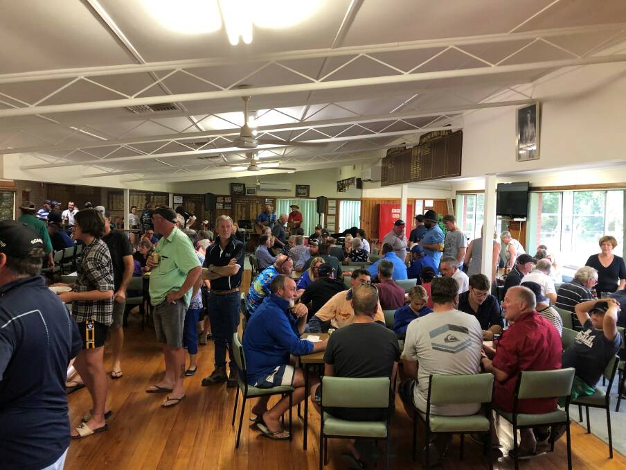 Community members gather at the Corryong Bowls Club to thank the Timboon Lions Club. 