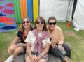 Family: Jennifer Farley, Carolyn Thomas and Monique Farley enjoy the relaxed atmosphere at Folkie. Picture: Kyra Gillespie