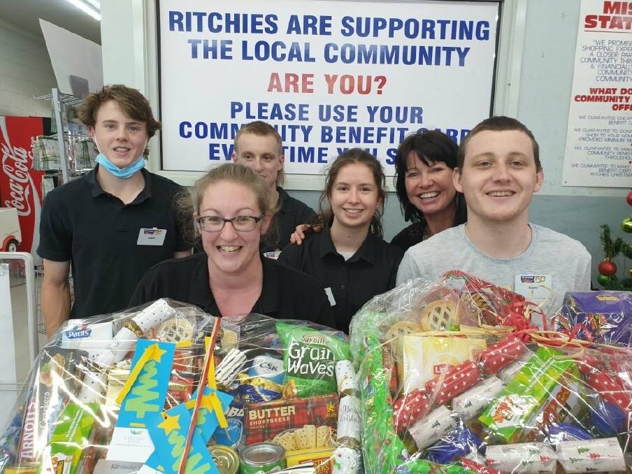The Ritchies IGA Camperdown team with their donated Christmas hampers to go to a local family who is doing it tough this year. 