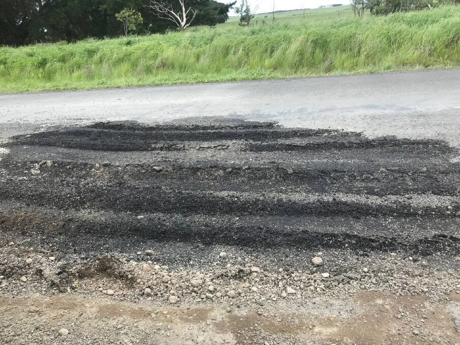 Patch-up: A picture of the slurry placed over a pothole along Warrnambool-Caramut Road.