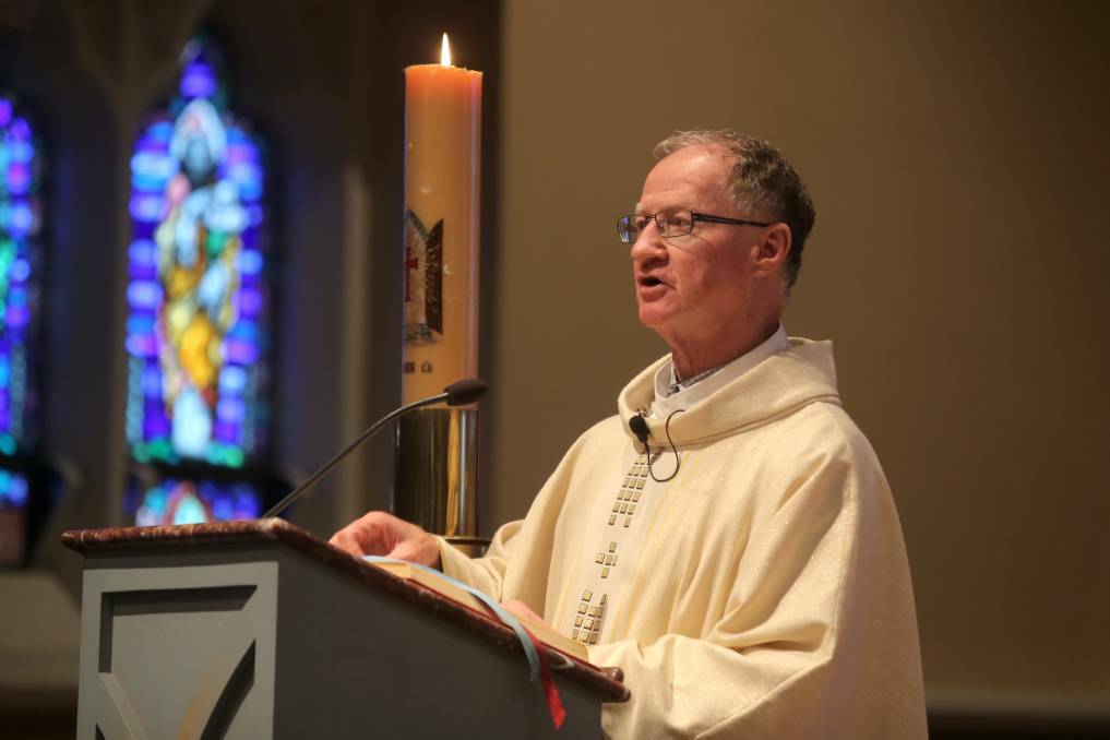 Mass done differently: Father John Fitzgerald. 