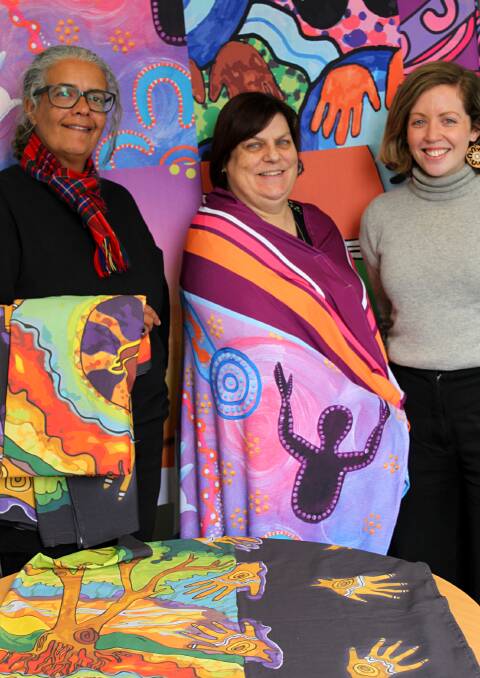 Artist shawls: Susan Forrester from VACCHO, Andrea Casey from Cancer Victoria and Lisa Joyce from BreastScreen Victoria with the artist shawls. 
