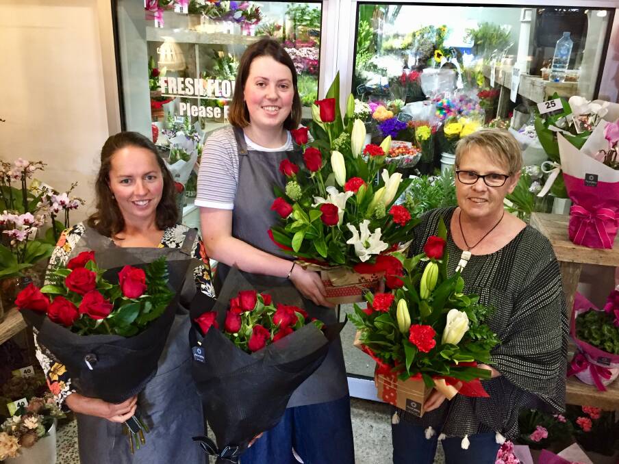 Best of the bunch: Allesha Gardner, Chloe McCosh and Maureen O'Connor with their Valentine's Day picks at Flower Gallery Warrnambool. Picture: Kyra Gillespie
