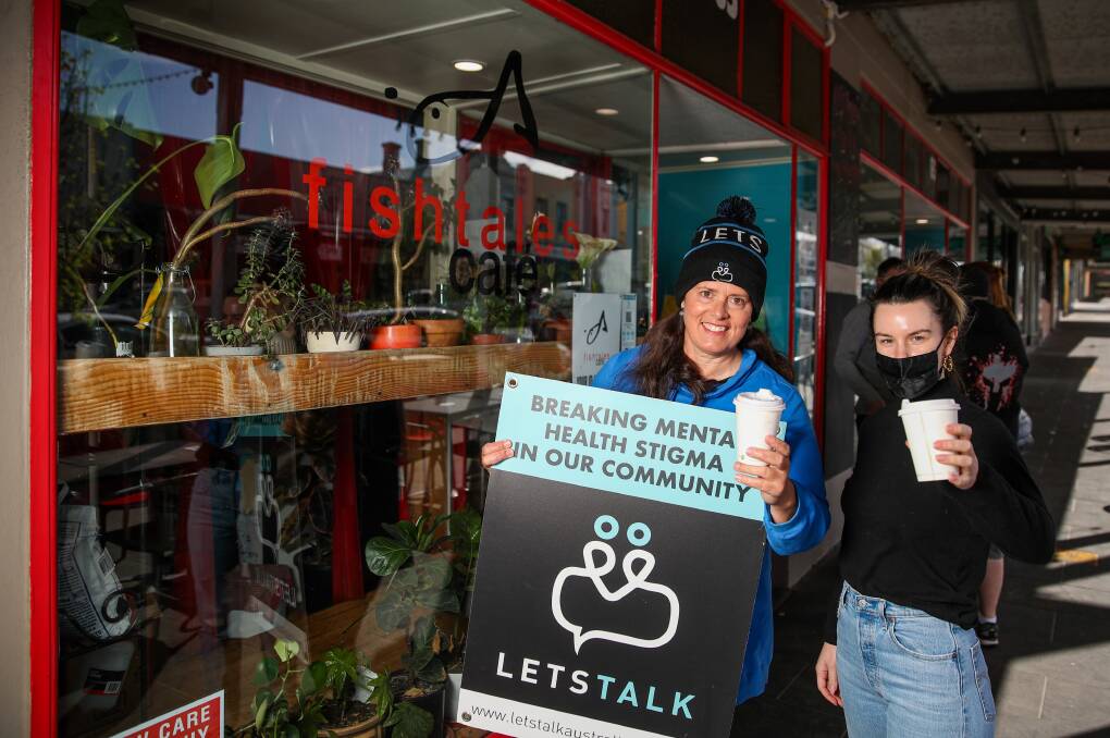 PATIENCE PLEASE: Jacinta Roache and Meg Kenshole are reminding people to be kind in these times. Let's Talk Foundation and Fishtales Cafe are teaming up for mental health month, offering free coffees all next week to encourage the community to get active. Picture: Morgan Hancock