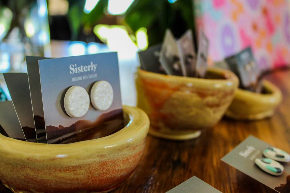 A selection of Sisterly's handmade clay earrings in handmade clay pots. Picture: Kyra Gillespie