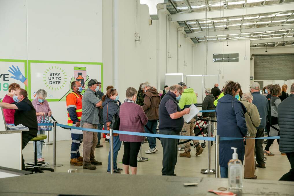 Lines grow at Warrnambool's community vaccination centre on Merri Street. Picture: Chris Doheny