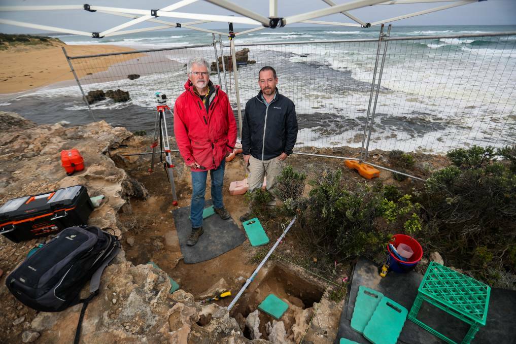 DIGGING FOR HISTORY: Monash University's Indigenous archaeology professor Ian McNiven and US research fellow Joe Crouch when they dug up two possible fireplaces on cliff faces near the mouth of Warrnambool's Hopkins River in 2019. Picture: Morgan Hancock
