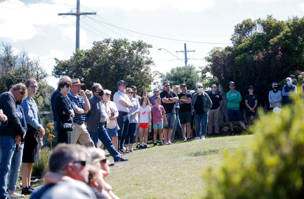 A strong crowd watches the Liebig Street auction. Picture: Anthony Brady