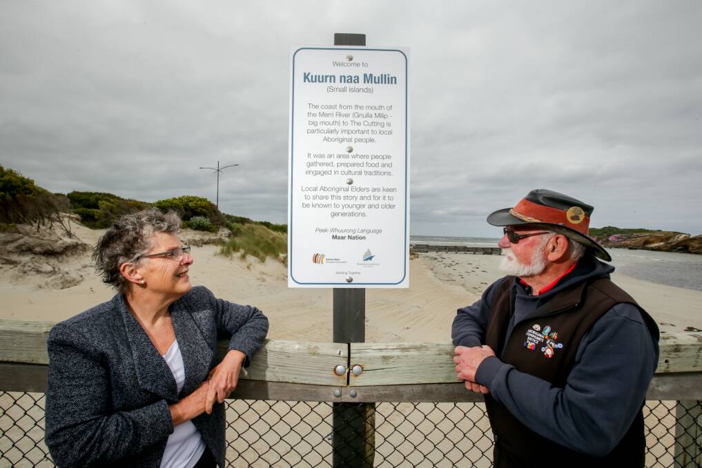 NEW: Warrnambool councillor Vicki Jellie and Gunditjmara Elder Uncle Robbie Lowe Senior with the reinstated sign in the Peek-Whuurong language of the Maar Nation. Picture: Chris Doheny
