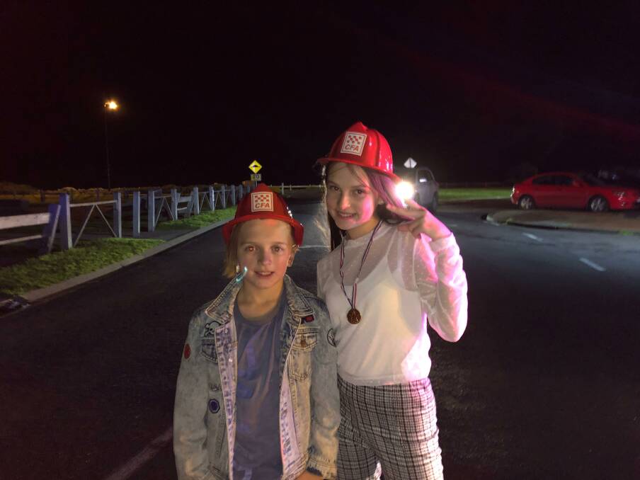 Exciting: Max and Taliah scored their own firefighter hats. 