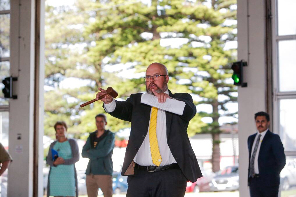 Auctioneer Jason Thwaites at the former Warrnambool Fire Station site. Picture: Anthony Brady