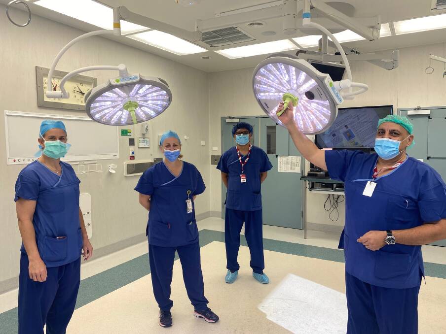 SWH clinical educator Megan Titmus (from left) and theatre nurse unit manager Melissa Coffey with Draeger IP project/operations manager Asif Momin and account manager Max Khairy in one of SWH's three theatres to receive the new lighting. 