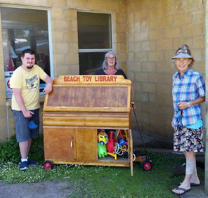 Daniel Spencer, Julie Heard and Annie Schofield with the new Port Campbell beach toy library. Picture: Supplied
