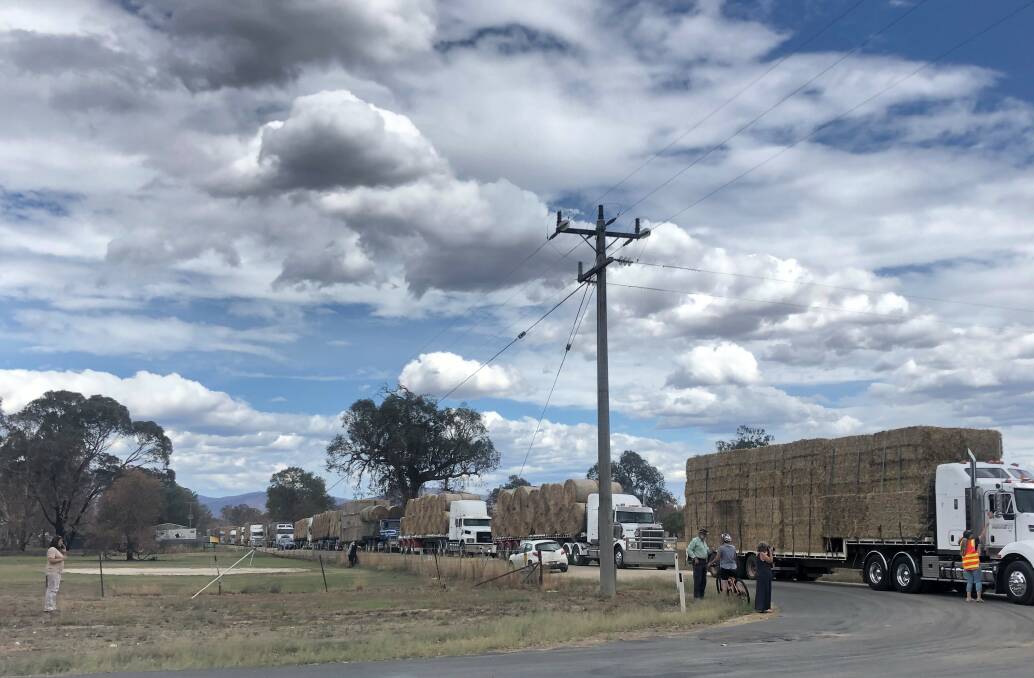 The Timboon Lions Club delivering hay to fire-affected farmers in Corryong. 