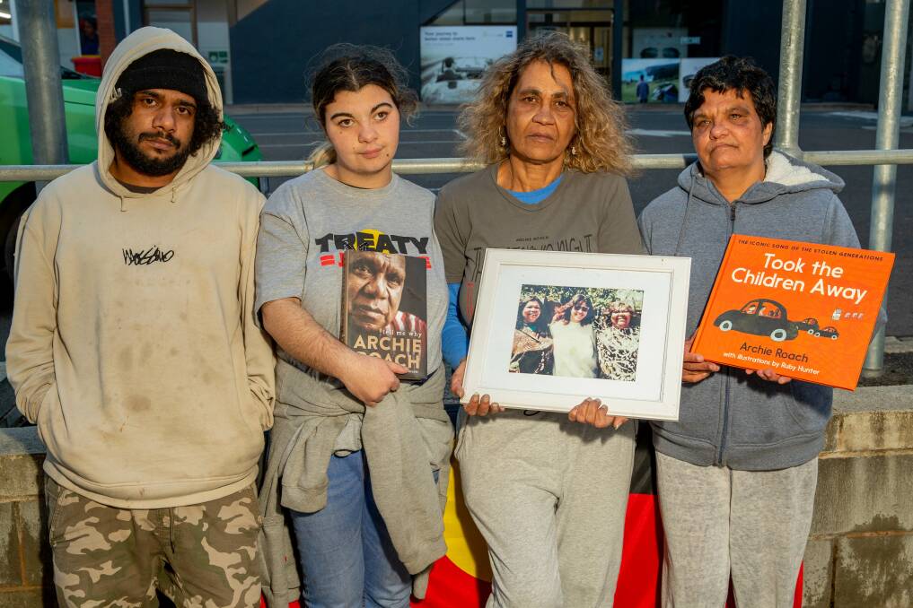 Jamal Thorpe, Tamika Clark, Tracy Roach and Bernie Clark protest the continued removal of Indigenous children from their families. Picture: Chris Doheny