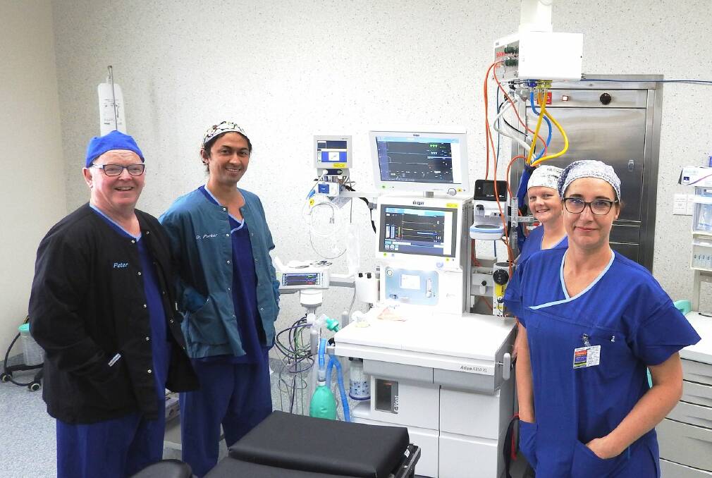 Shortage solution: Anaesthetists Dr Peter Reid and Jun Parker, and theatre nurses Pip Wombell and Nicola Dutton. 