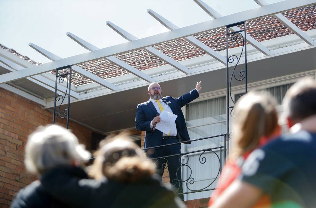 Ray White Warrnambool real estate agent Jason Thwaites at the Liebig Street auction. Picture: Anthony Brady
