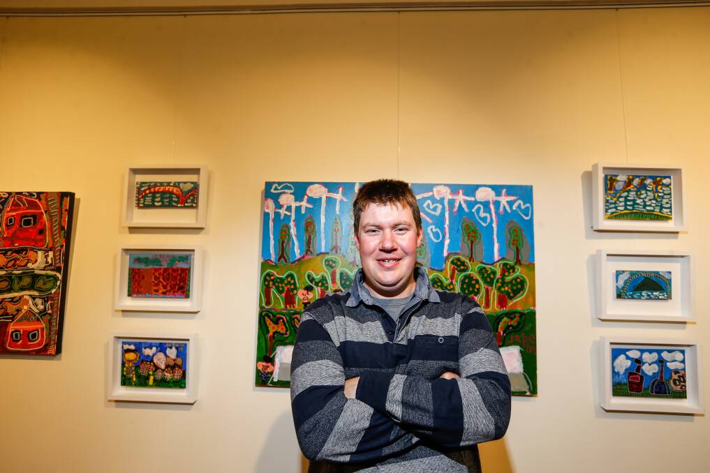 Jake Morgan started out painting bridges and his work has developed to tell stories. Picture: Anthony Brady