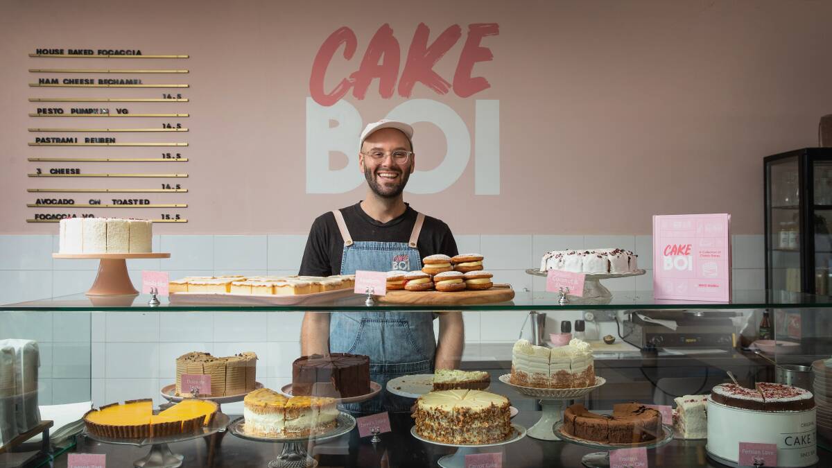 Reece Hignell in his Newcastle cafe where he sells his classic bakes. Picture by Marina Neil