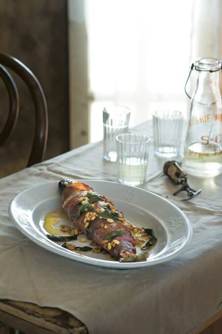 Roasted prosciutto-wrapped trout with sage burnt butter and pine nuts. Picture by Alan Benson