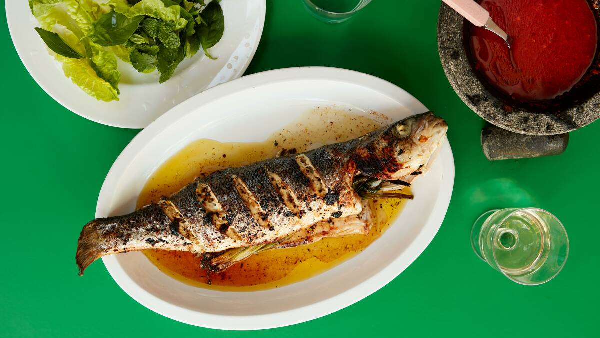 Brown butter sea bass with tangerine dipping sauce and lots of herbs. Picture: Supplied