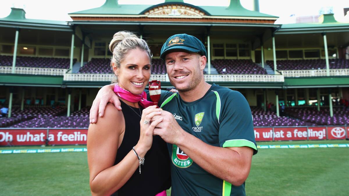 Candice and David Warner pose with the Ashes urn at the Sydney Cricket Ground in 2014. Picture Getty Images