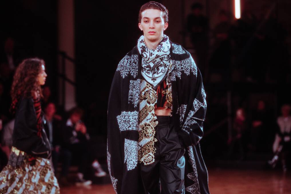 WOOLMARK PRIZE WINNER: A model wears one of the designs which won emerging London designer, Edward Crutchley, the International Woolmark Prize awards this year for menswear and innovation. 