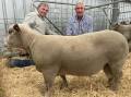 Camlea stud principal Kevin Feakins and LMB Livestock agent Bernie Grant with the $5400 ram.