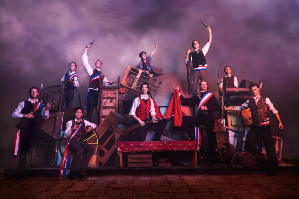 Production shot of the Les Miserable cast on the Barricade. Picture: Maja Pearson