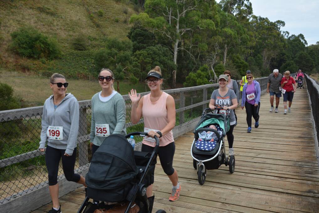 Community fun: Participants make their way across the Timboon trestle bridge during the 2018 Trestle 10 fun run. Picture: Graham Arkinstall