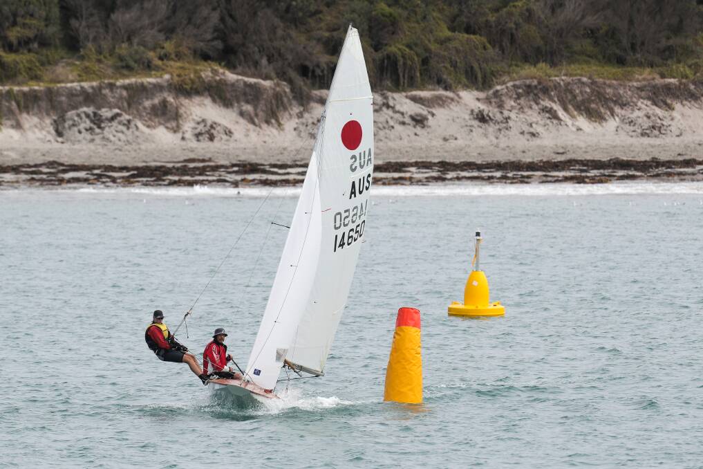 Racing around: Warrnambool's Jas Shears and Don Allen pass a marker bouy during a regatta.