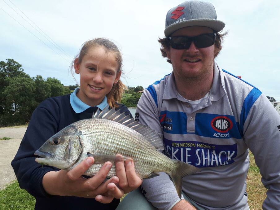 ANGLING FOR A CATCH: Shaylee Ralston and Corey McLaren with a bream from the St Joseph's fishing clinic.