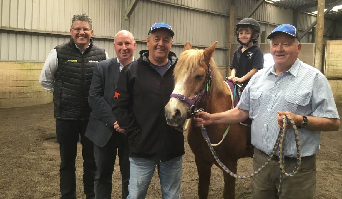 GOOD CAUSE: Warrnambool Racing Club's Tom O'Connor and Nick Rule, trainer Lindsey Smith, Kyson and Noel Saffin at Riding for the Disabled.