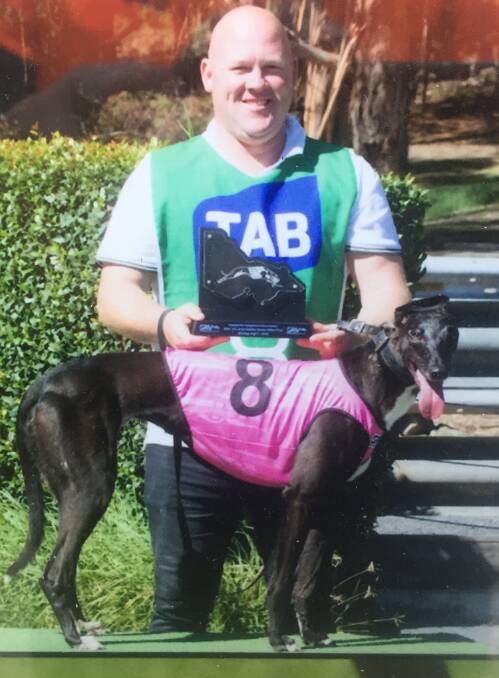 SPECIAL: Adam Richardson and Mepunga Isla with the trophy she won after taking out the Geelong Oaks. Her next run will be at Sandown. 