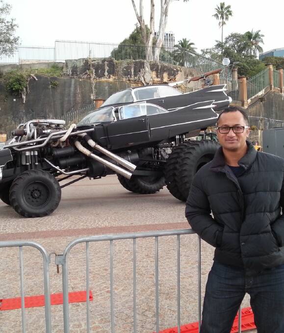 GLORY FOR FURY: Richard Pritchard with one of the vehicles from the Oscar-winning film Mad Max: Fury Road. Pritchard worked in the art department on the film, which won six Academy Awards earlier this week.