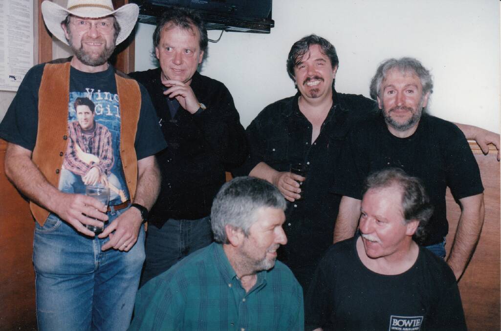 The Dead Livers in 1999 - (back from left) Michael Schack, Marty Atchison, Rodger Delfos, and John Berto. (front from left) Brendan Mitchell and Richard O'Keefe.