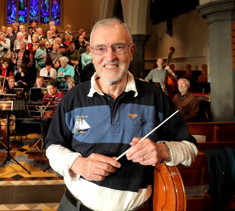 SYMPHONY OF SOUND: Warrnambool's Ken Stott, pictured with the Warrnambool Symphony Orchestra, has written a cantata called The Day Is Ended, which will be performed by Hamilton Symphony Orchestra. 