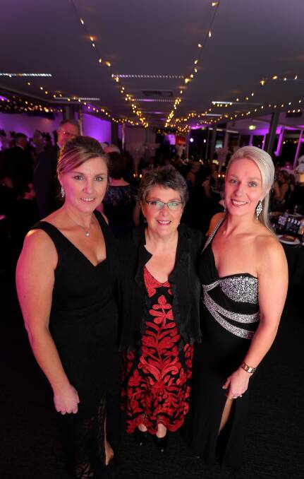 HAVING A BALL: Waves Gala Ball committee members Bernie Price, Vicki Jellie and Sue Swayn at Saturday night's event. Picture: Rob Gunstone 
