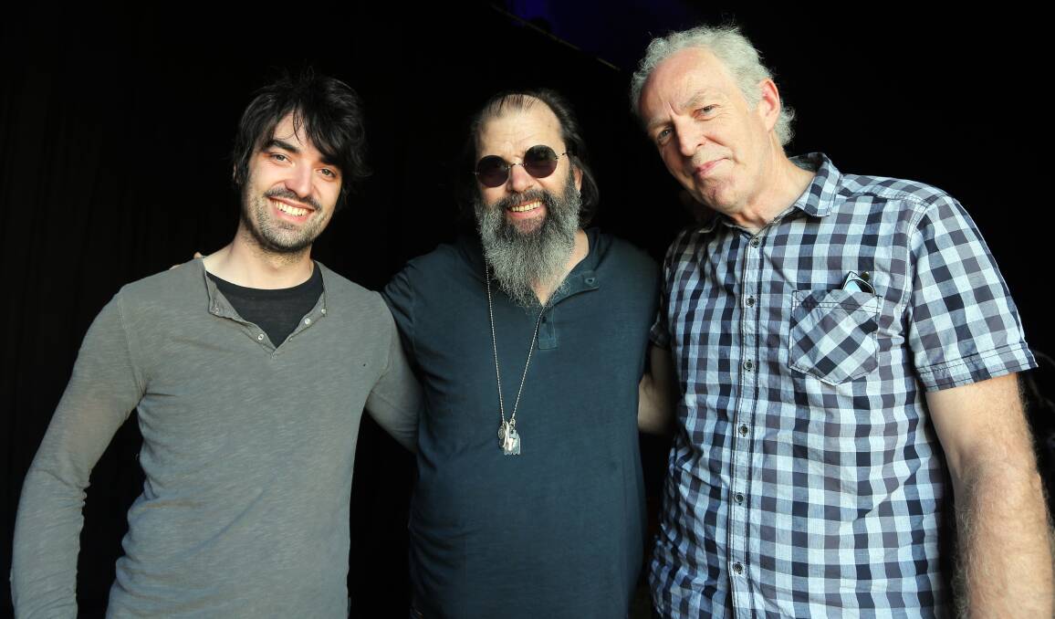 GUITAR TOWN: (from left) Daniel Gilchrist, Steve Earle and Stephen Gilchrist caught up backstage to talk instruments before Earle's set at the Folkie. Picture: Rob Gunstone