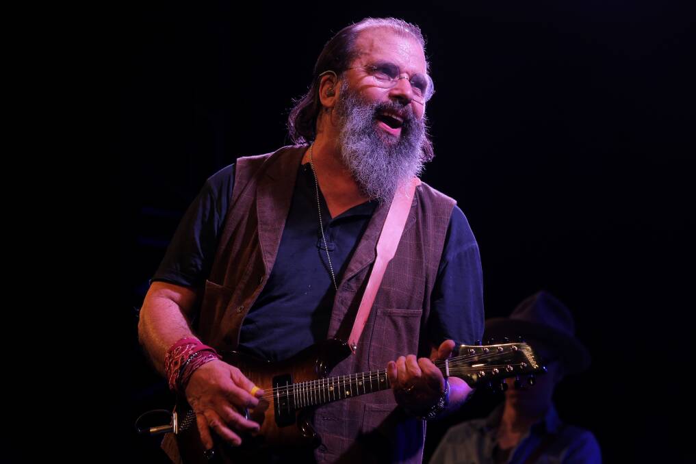 Steve Earle plays Copperhead Road on one of his Gilchrist mandolins at the Folkie. Picture: Rob Gunstone