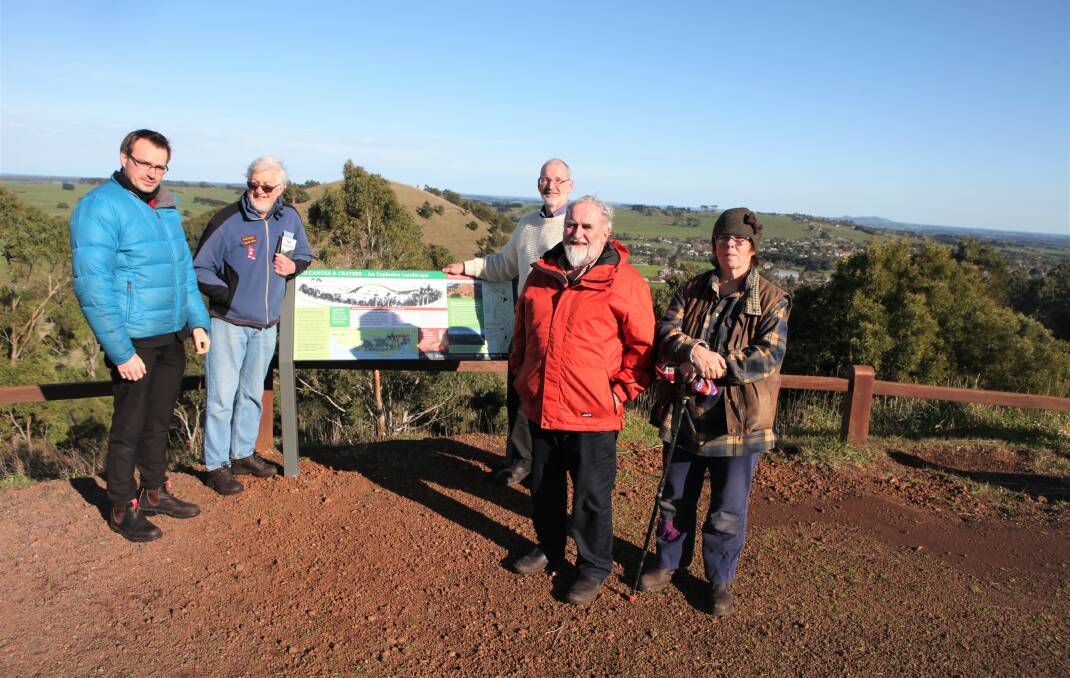 Project: Corangamite Shire environment projects officer Roland Herbert with fellow Mount Leura and Mount Sugarloaf Management Committee members Graham Arkinstall, Garth Wesson, Greg Farmer and Frances Grundy at one of the new signs overlooking Mount Sugarloaf. 